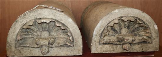 A pair of reconstituted stone D shaped appliques W.41cm